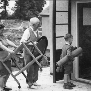 A family moving into their brand new Easiform home at Patchway, Bristol in 1953.