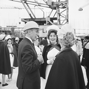 Sir Kirby Laing speaks to nursing sisters during topping out at St Thomas